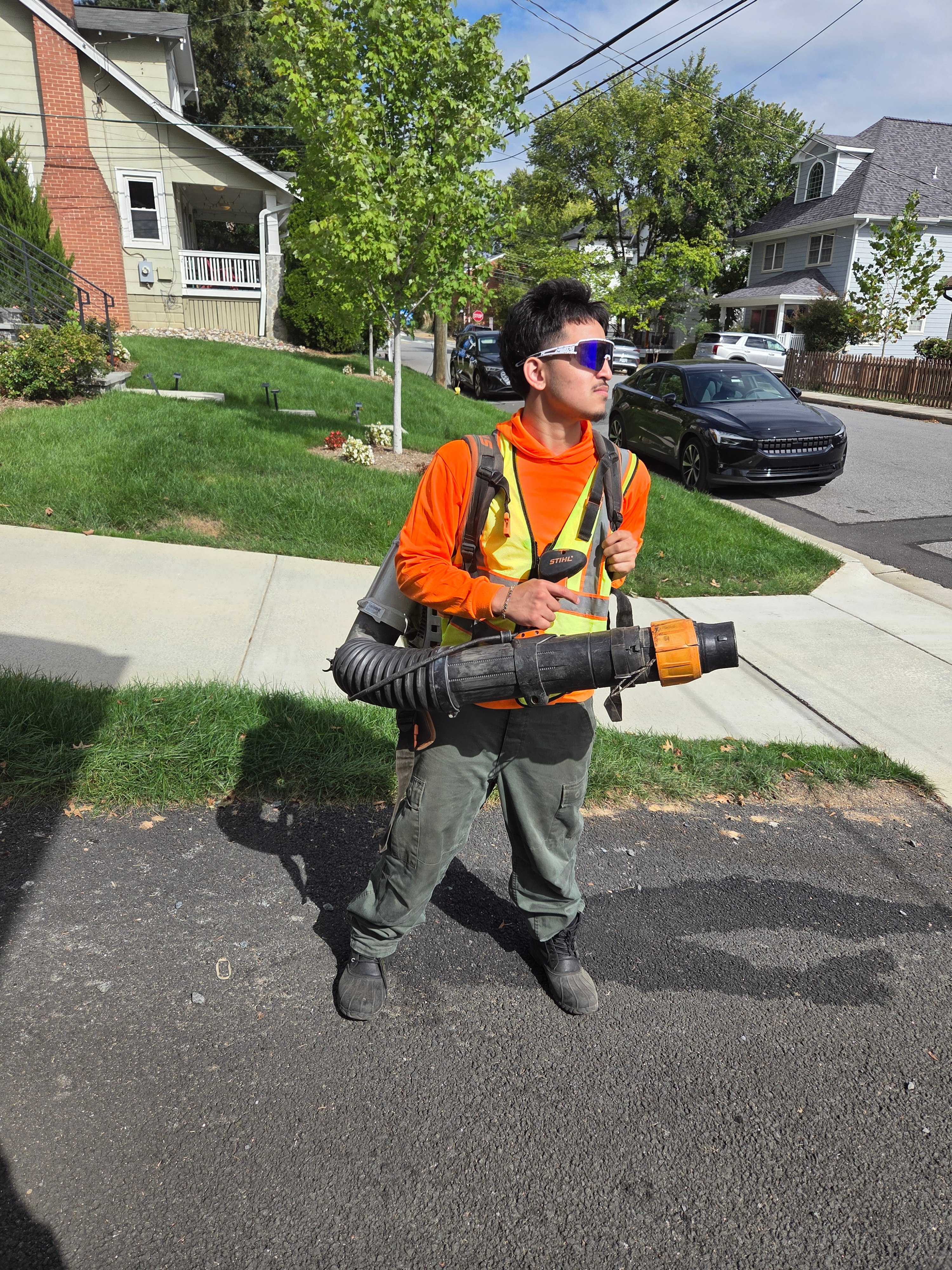 Professional landscaping team member ready to serve
